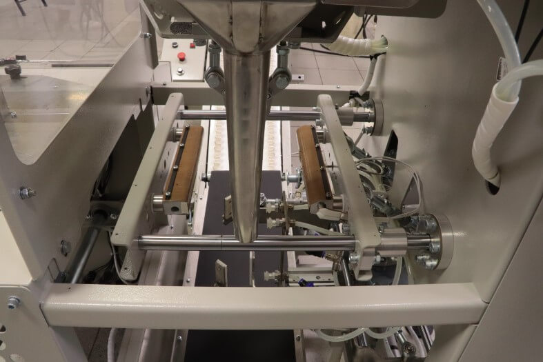 фасовочно упаковочная линия Инпак Дой-Пак фото