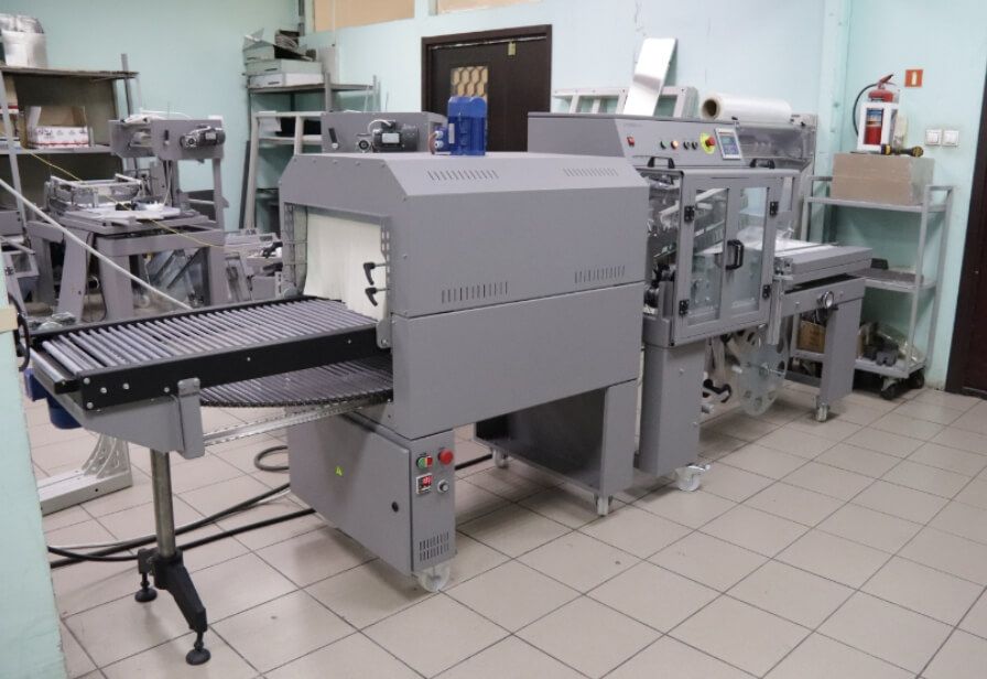 Упаковка кондитерских телевизоров. Термоусадочное оборудование “Рамка А” с термотоннелем “УТ 400.001” Упаковка кондитерских телевизоров. Термоусадочное оборудование “Рамка А” с термотоннелем “УТ 400.001”