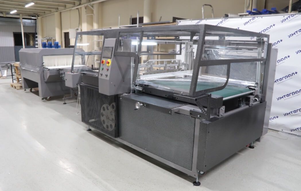 Упаковка эва-ковриков. Термоусадочный комплекс Рамка АМ800 + УТ1000 Упаковка эва-ковриков. Термоусадочный комплекс Рамка АМ800 + УТ1000