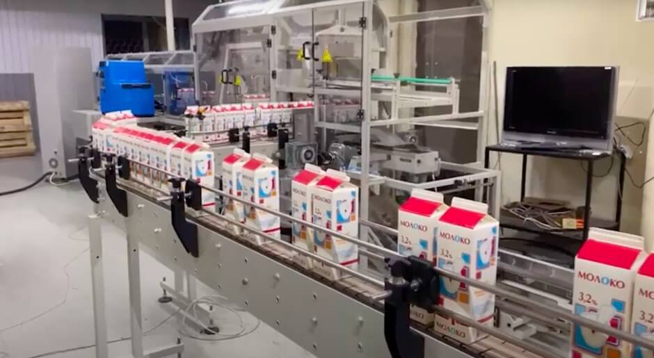 Оборудование для групповой упаковки молока Оборудование для групповой упаковки молока